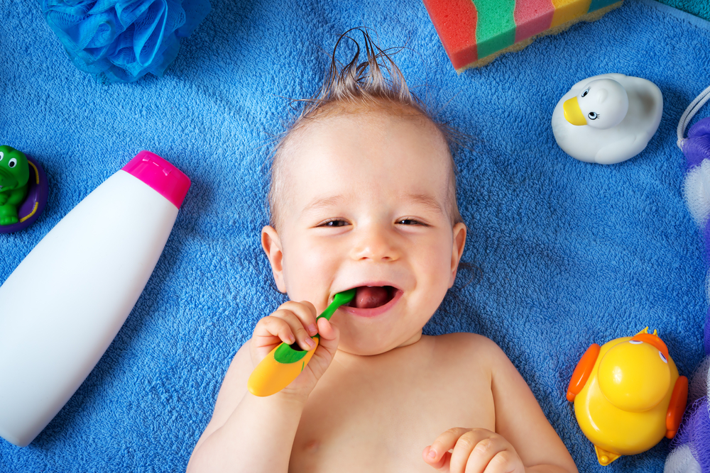 Baby Teeth Myths Boy Brushing Teeth Blue Towel